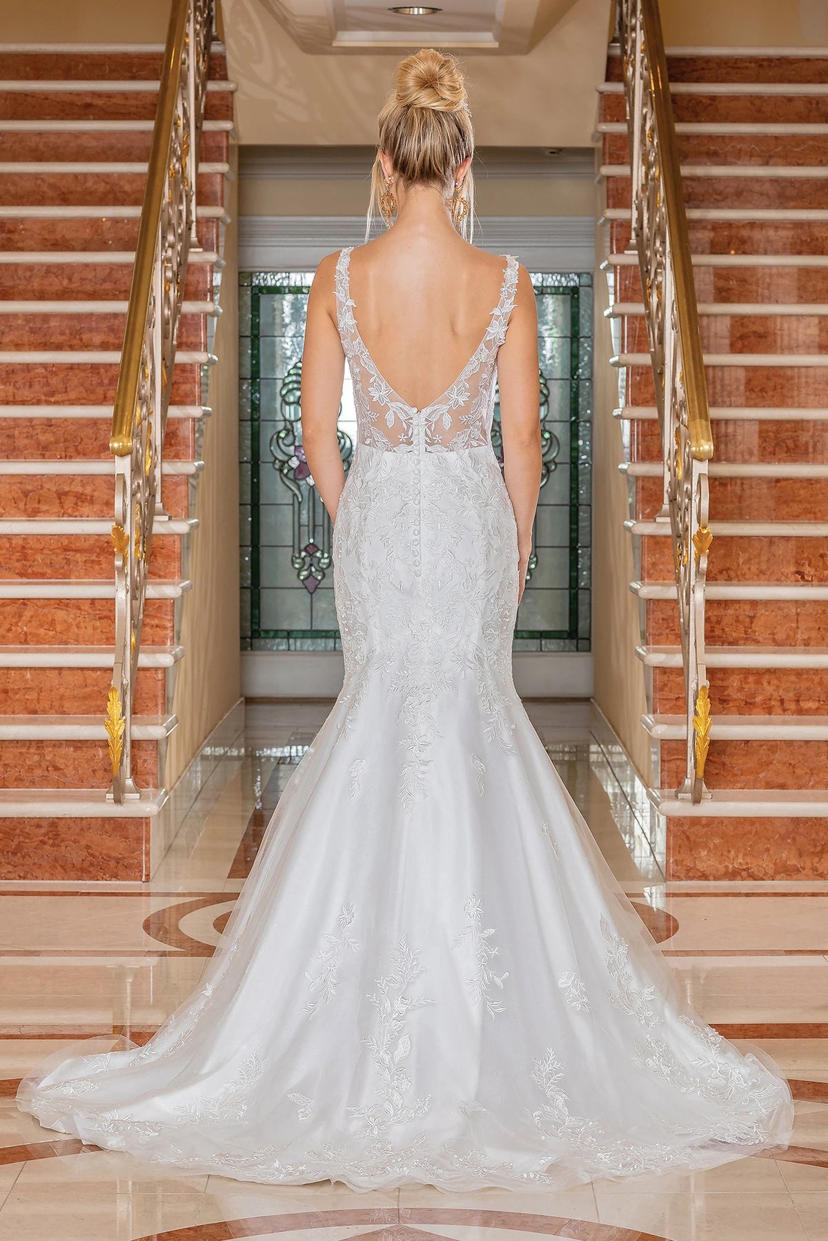 From the back, the Off-White wedding dress reveals its floor-length skirt.