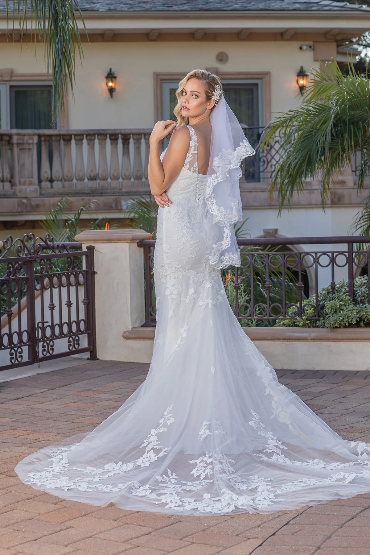 From the back, the Off-White wedding dress reveals its floor-length skirt.