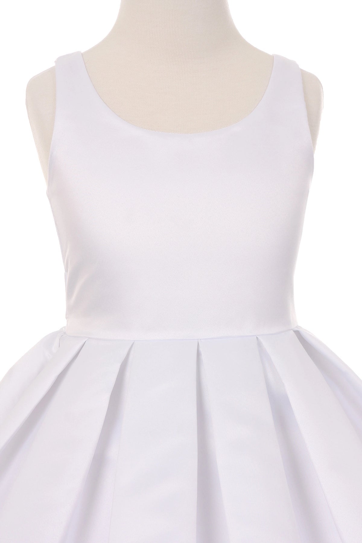 Visible on this White flower girl dress: scoop neckline above the pleated waist.