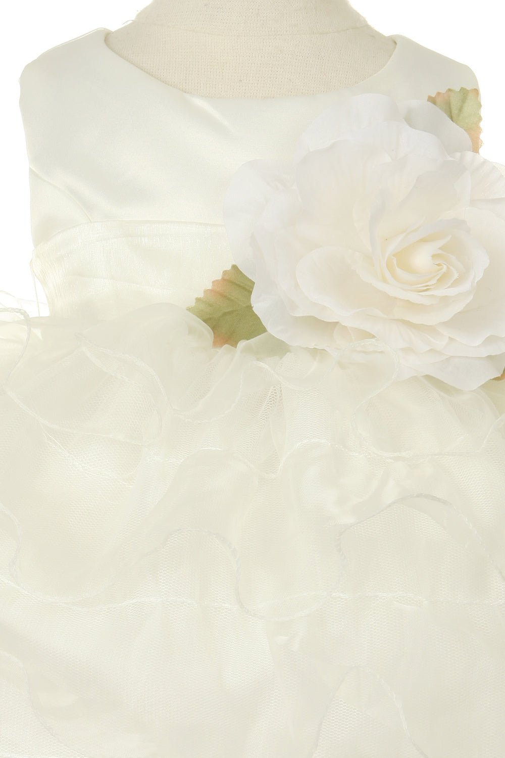 White rose flower girl dress back view highlighting layered skirt and soft silhouette.