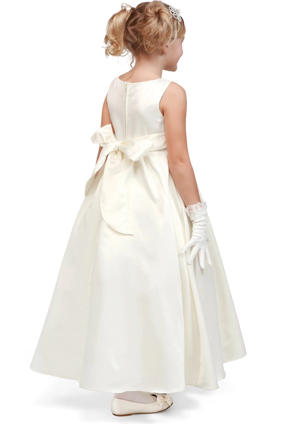 A Ivory flower girl dress showing back sash bow and center zipper.