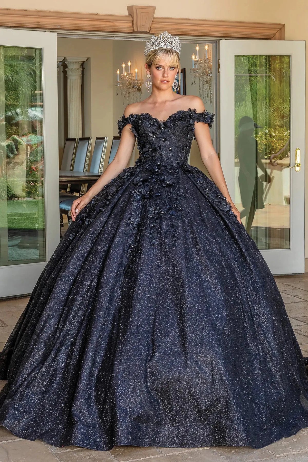 Back view of a Black quinceañera gown showing lace-up back