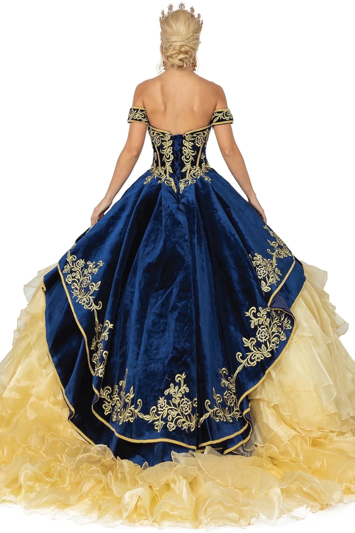 Back view of a Navy quinceañera gown showing lace-up back and layered tulle skirt