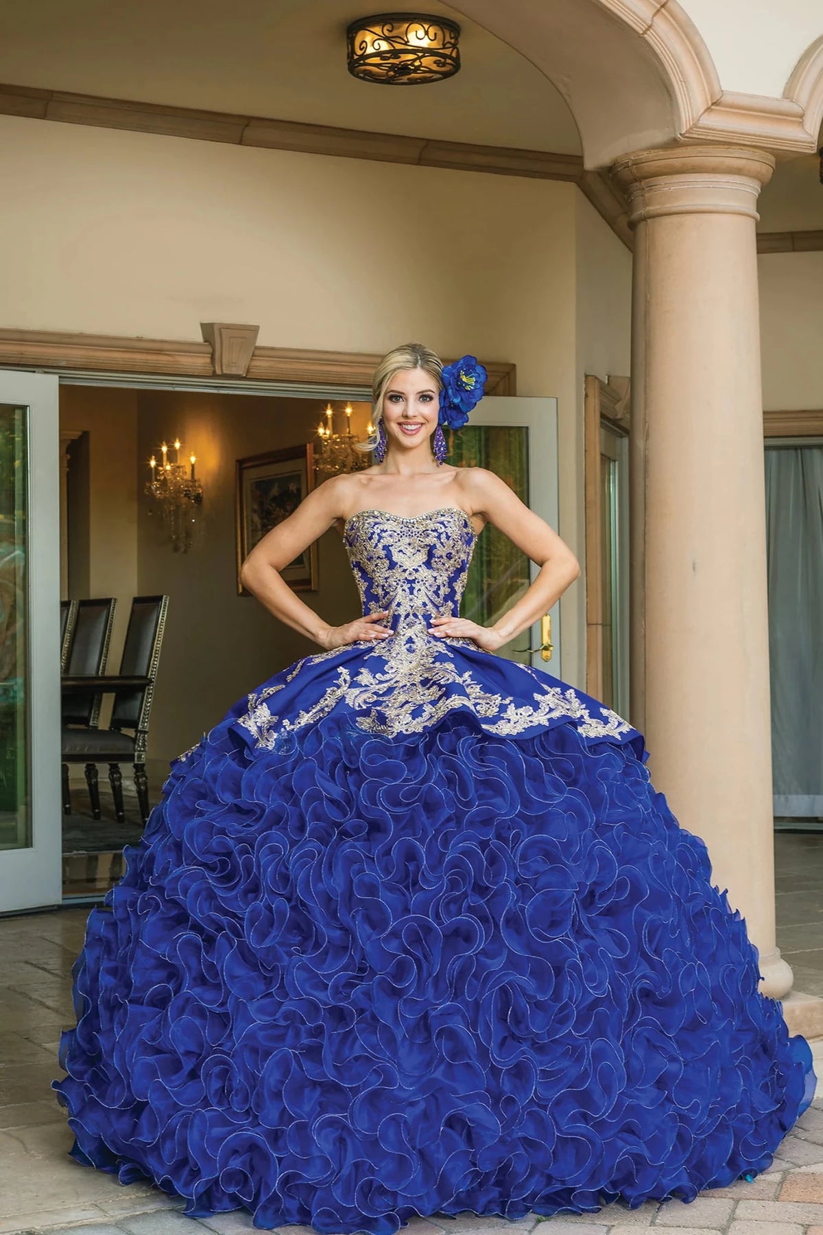 Additional full-length view of a Royal Blue quinceañera gown highlighting cascading organza ruffle skirt