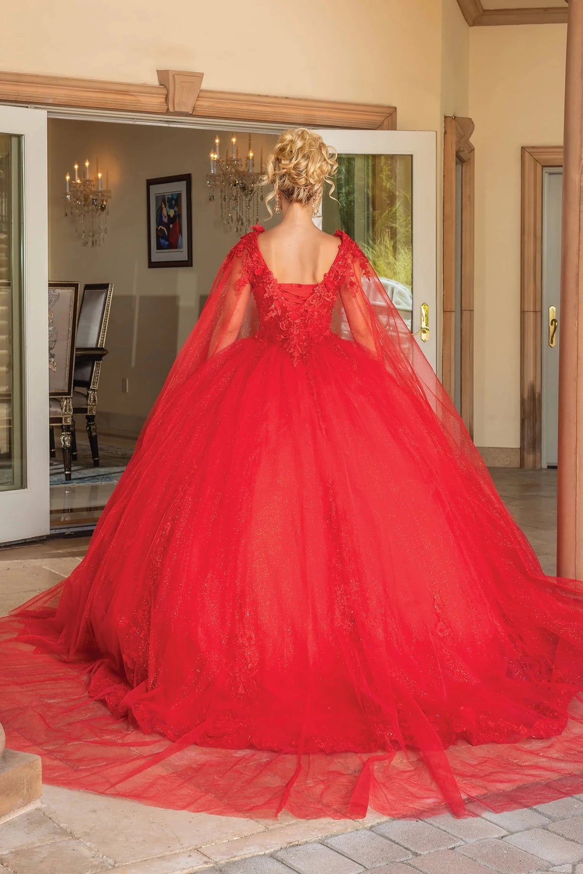 Alternate full-length view of a Red quinceañera gown highlighting voluminous full skirt and embroidered lace
