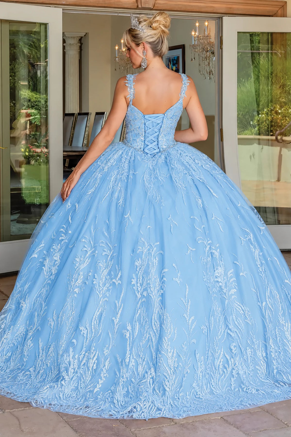 Blue embroidered overlay quinceanera dress, back view with lace-up closure