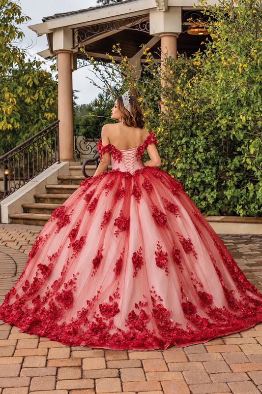 Back view of a Burgundy/Nude quinceañera gown showing lace-up back and floral embroidery