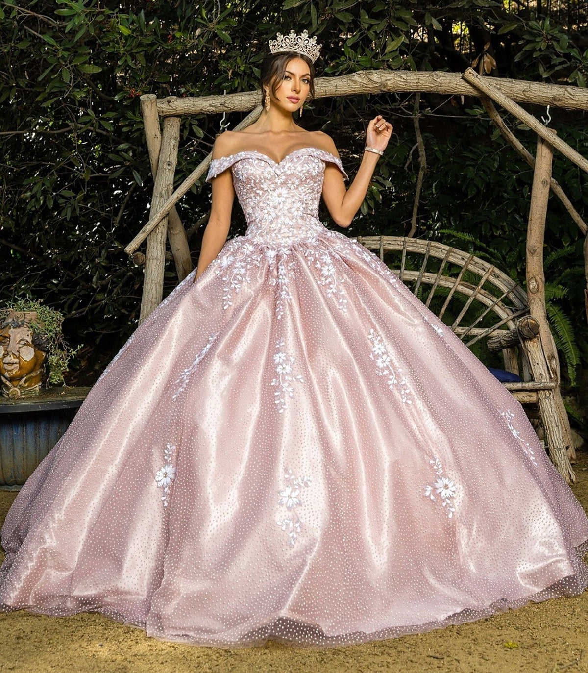 Bodice close-up highlights a dusty rose quinceanera dress with sweetheart neckline, sequin floral embroidery, and satin train.