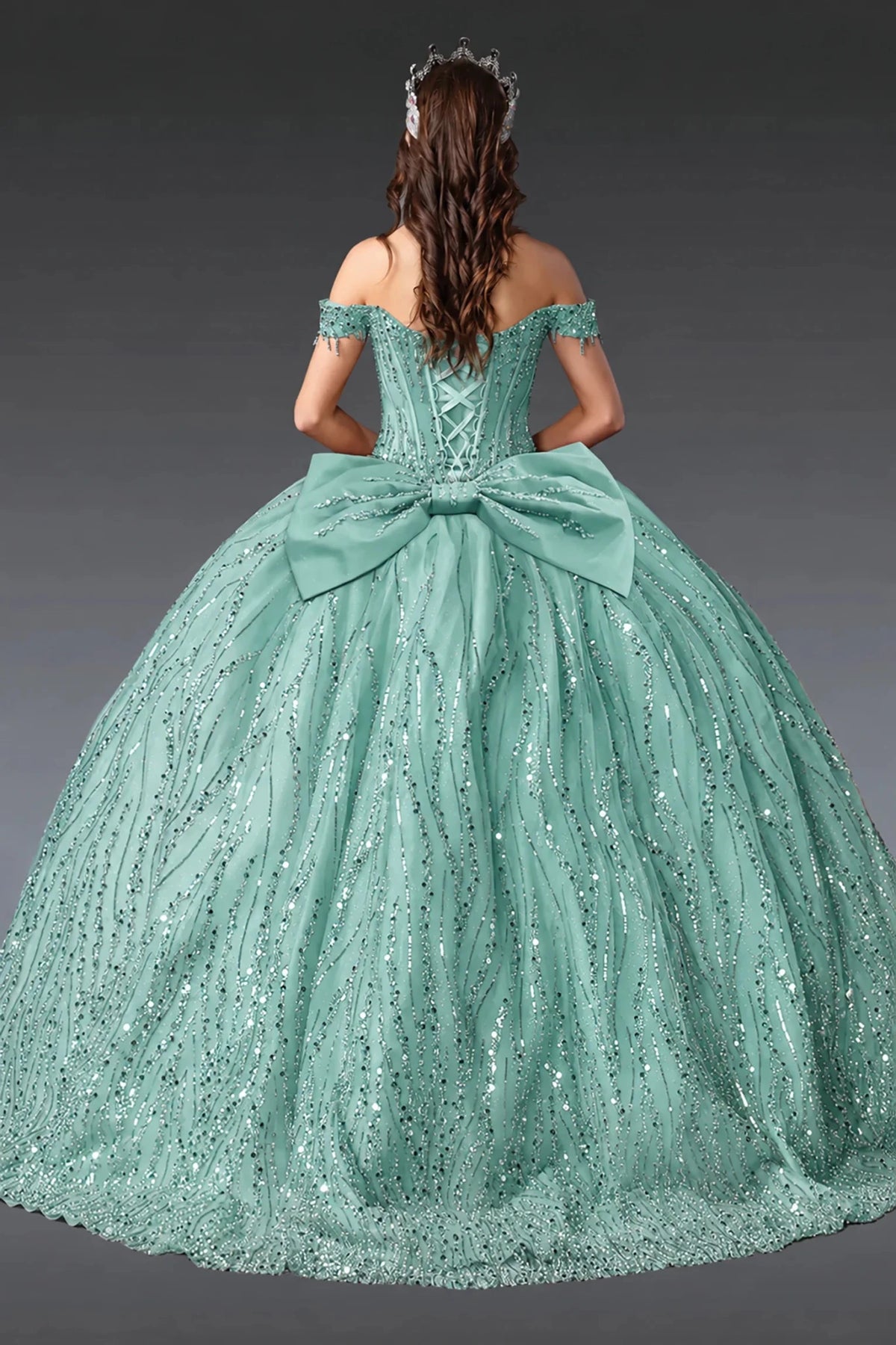 sage quinceañera ball gown with off-shoulder sleeves, lace-up beaded bodice, sequined overlay, and flowing sparkling skirt with train