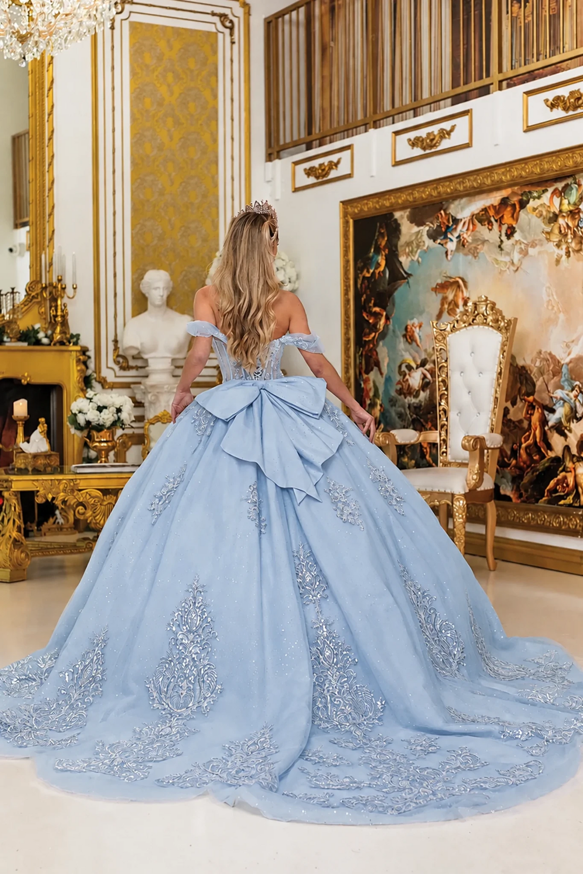 dusty blue quince dress with long train and big back bow