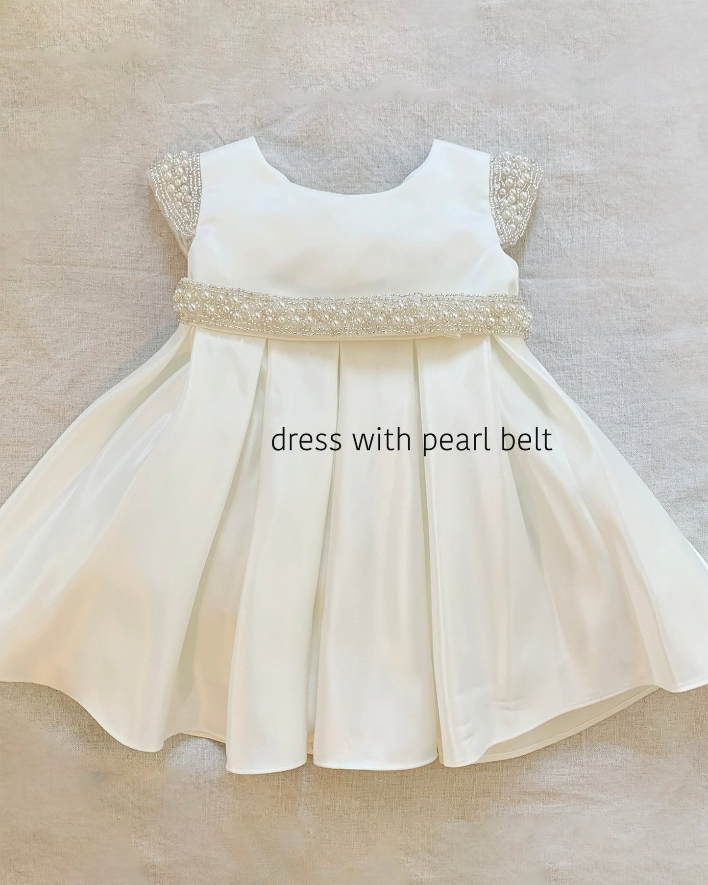 Ivory flower girl dress with pearl belt. Also suitable as a communion dress. Also suitable as a baptism dress.