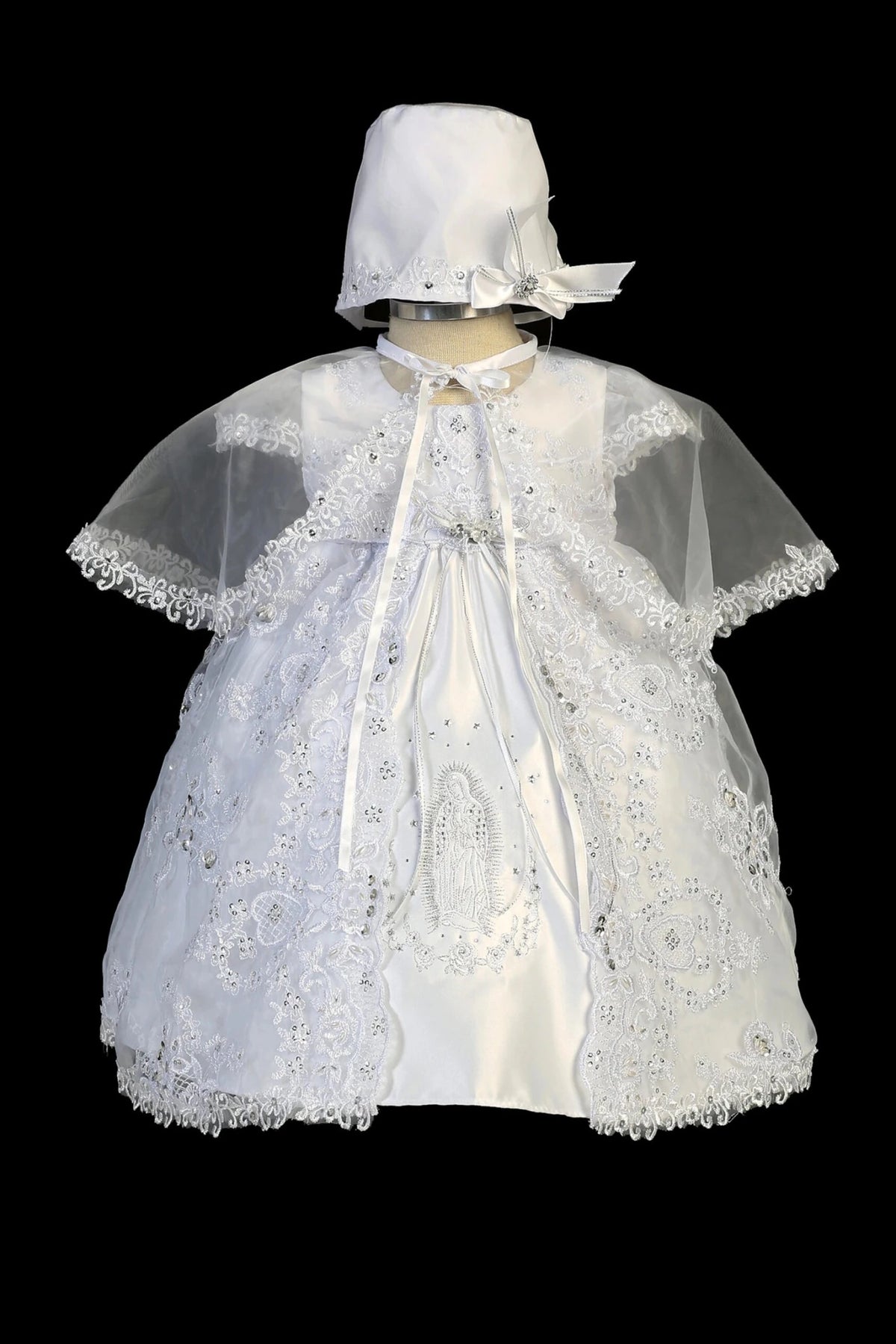 White baptism dress with sequined lace bodice and an organza overlay skirt.