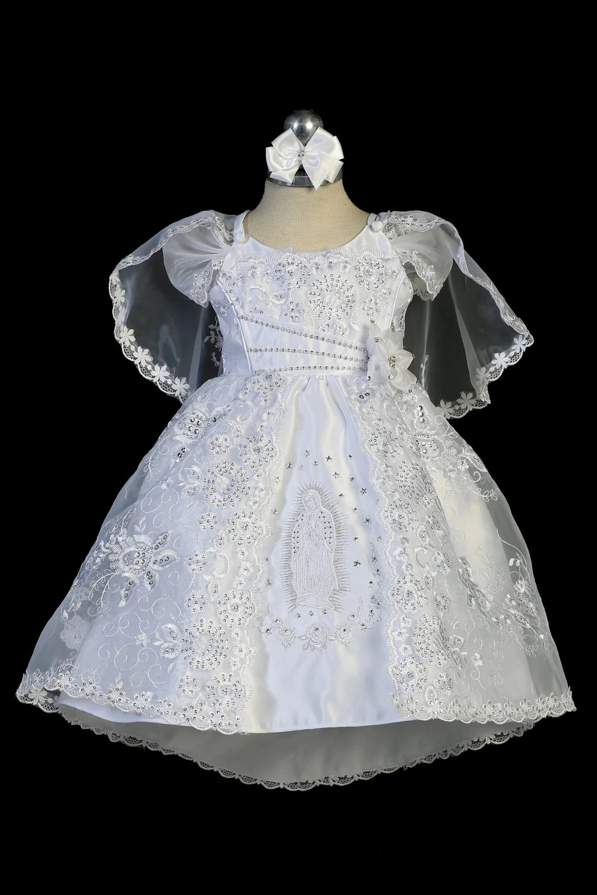 White christening dress with sequined lace bodice and rhinestone waist accent.