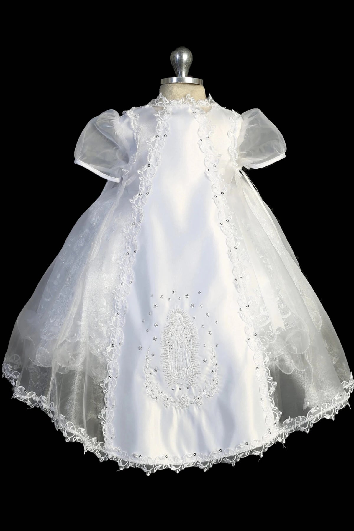 Back view of the White christening dress showing Virgin Mary embroidery on the organza vest.
