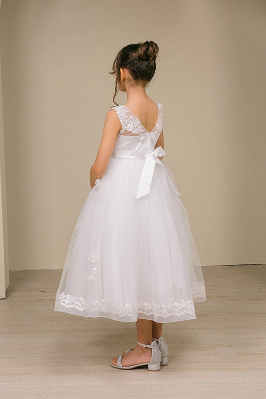 a girl wearing v back white floral lace dress on a beige background