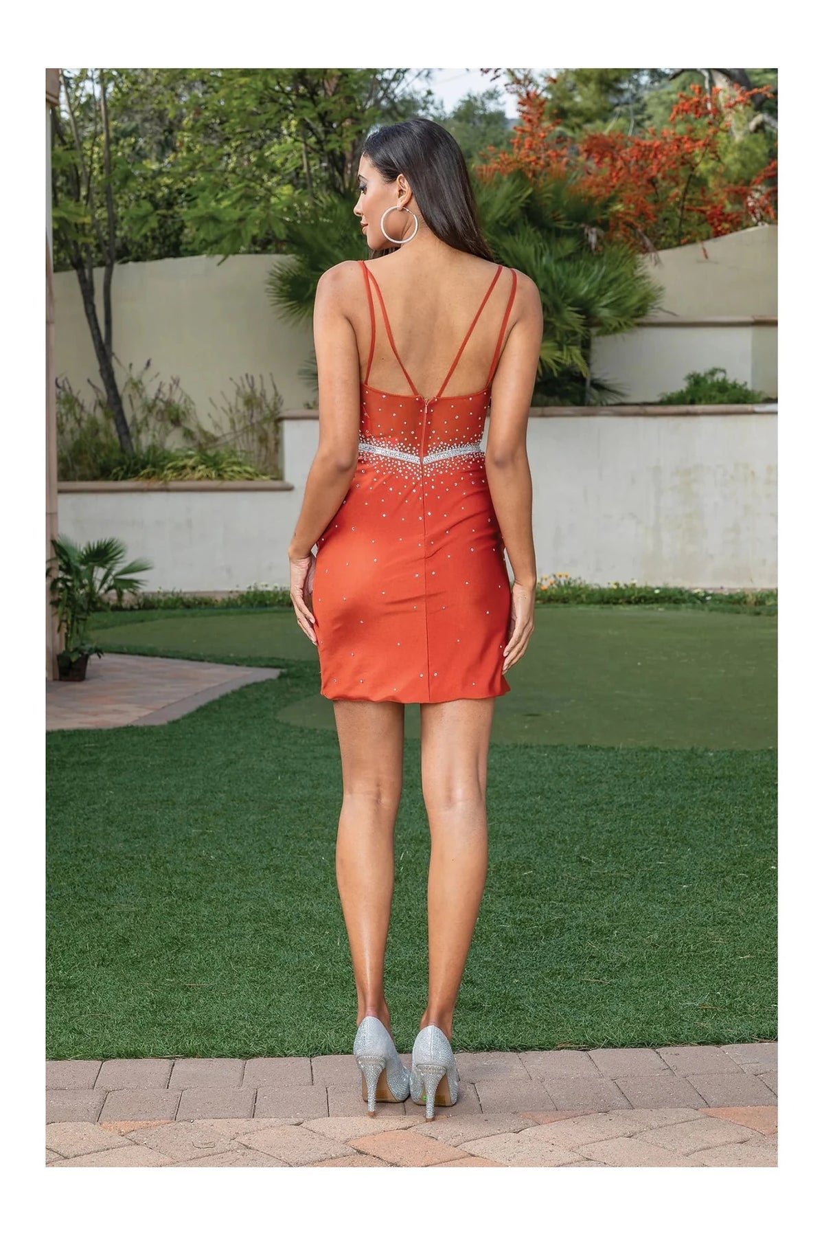 From the back, the Sienna homecoming dress reveals its above-knee hem.
