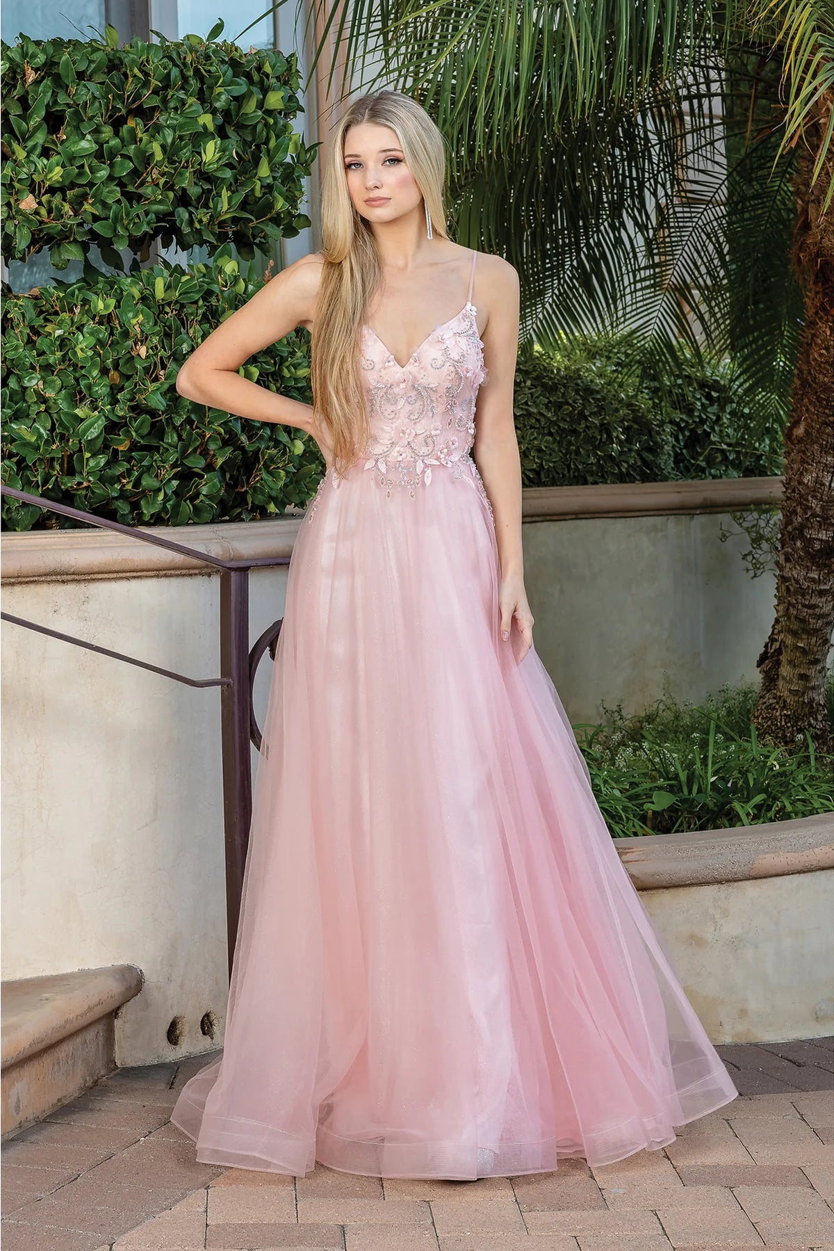 Featuring a floor-length skirt, this Blush prom dress is shown in full view.