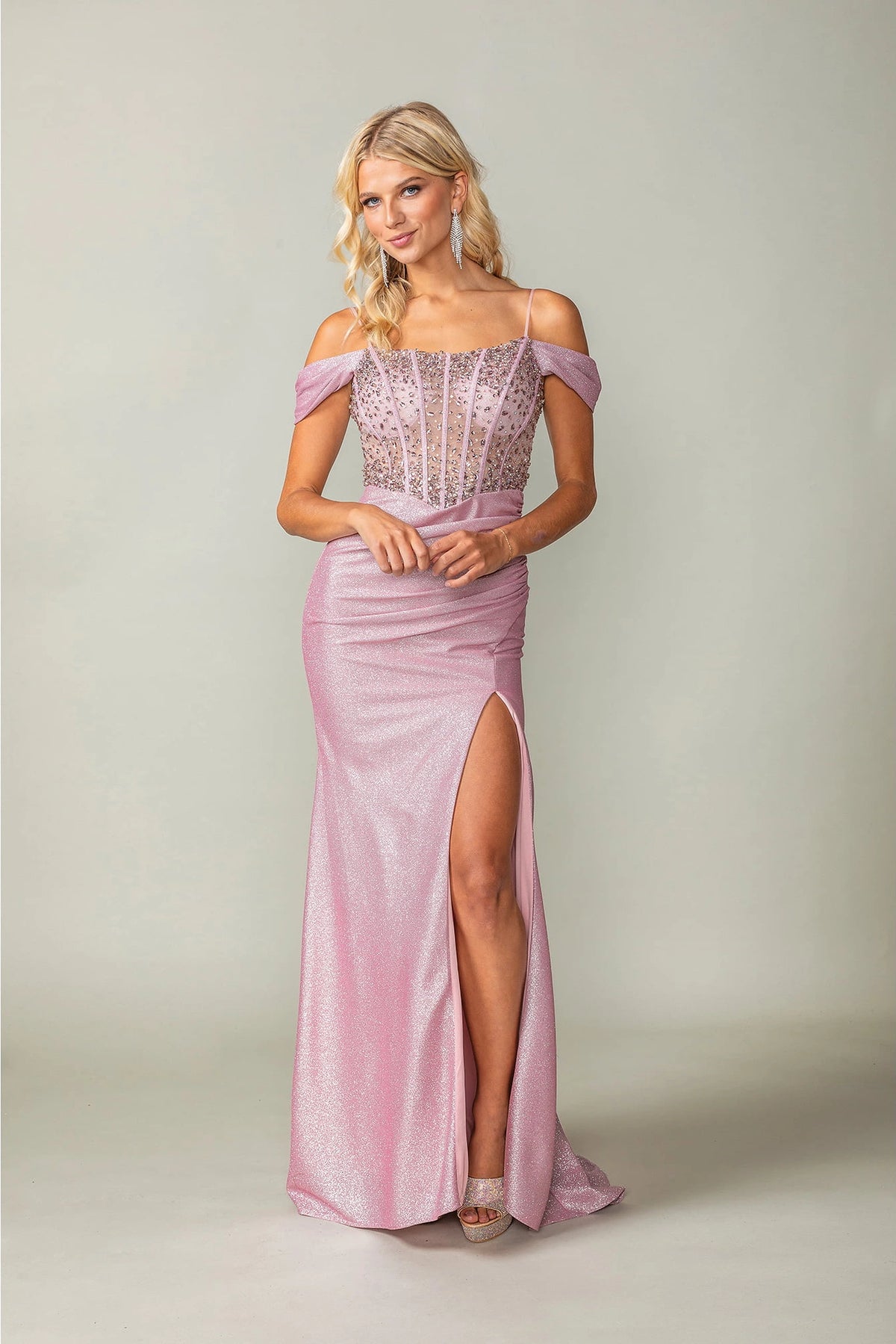 Featuring a floor-length skirt, this Blush prom dress is shown in full view.