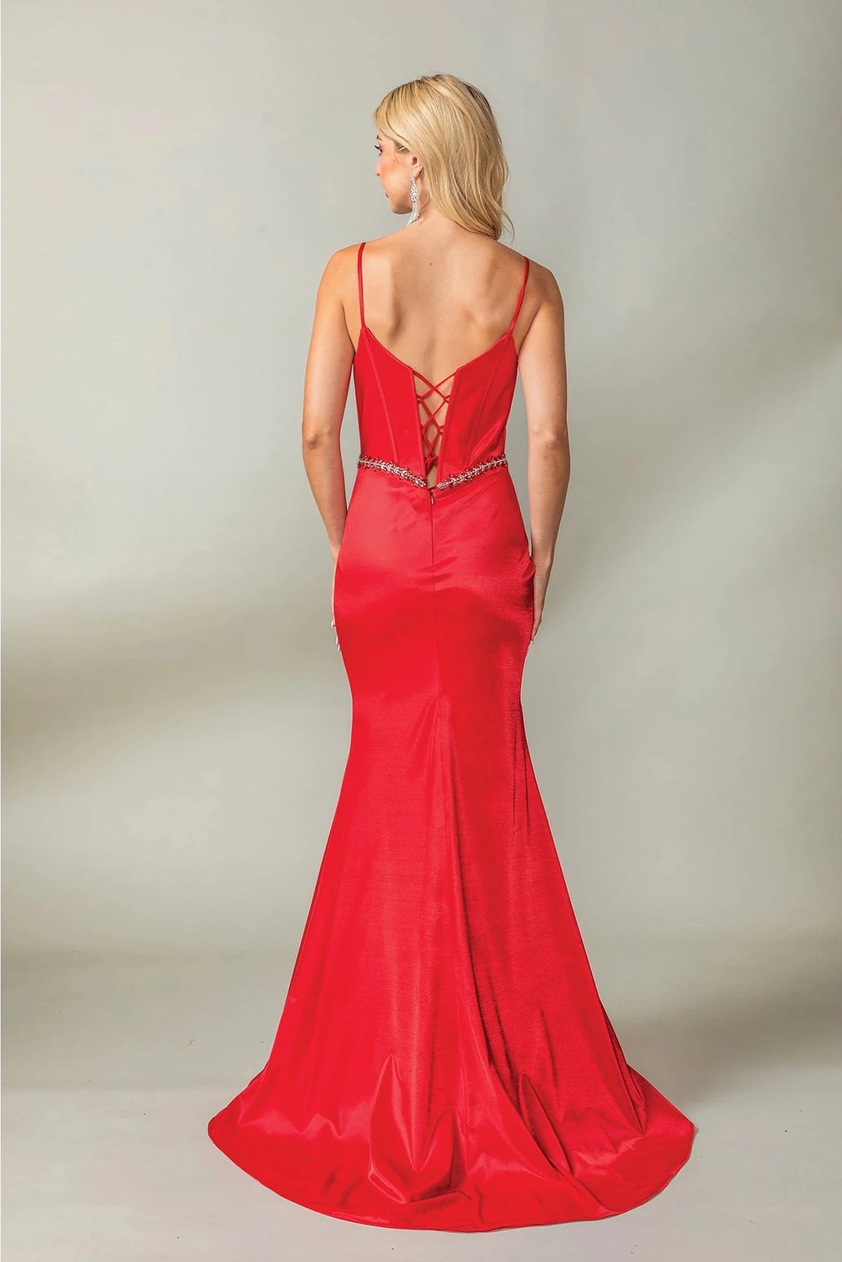 From the back, the Red prom dress reveals its floor-length skirt.