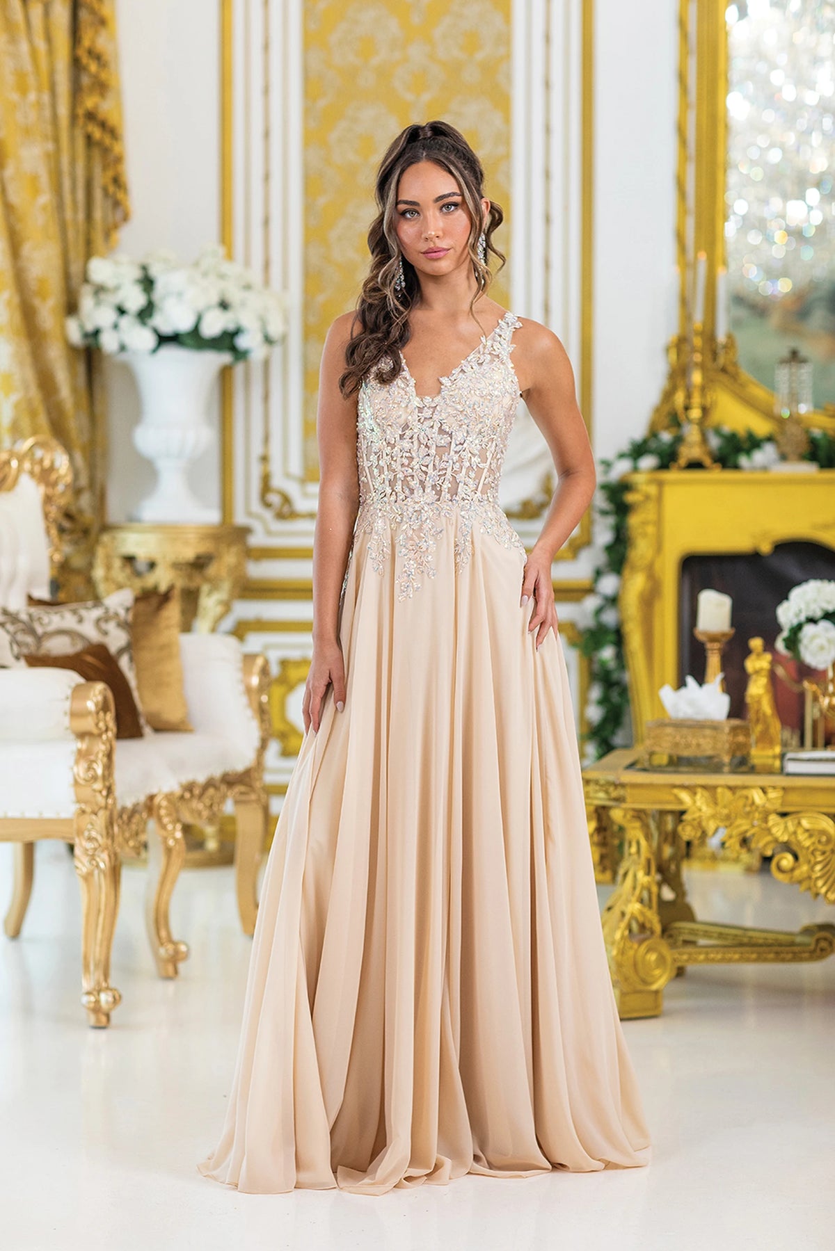 Featuring a floor-length skirt, this Champagne prom dress is shown in full view.