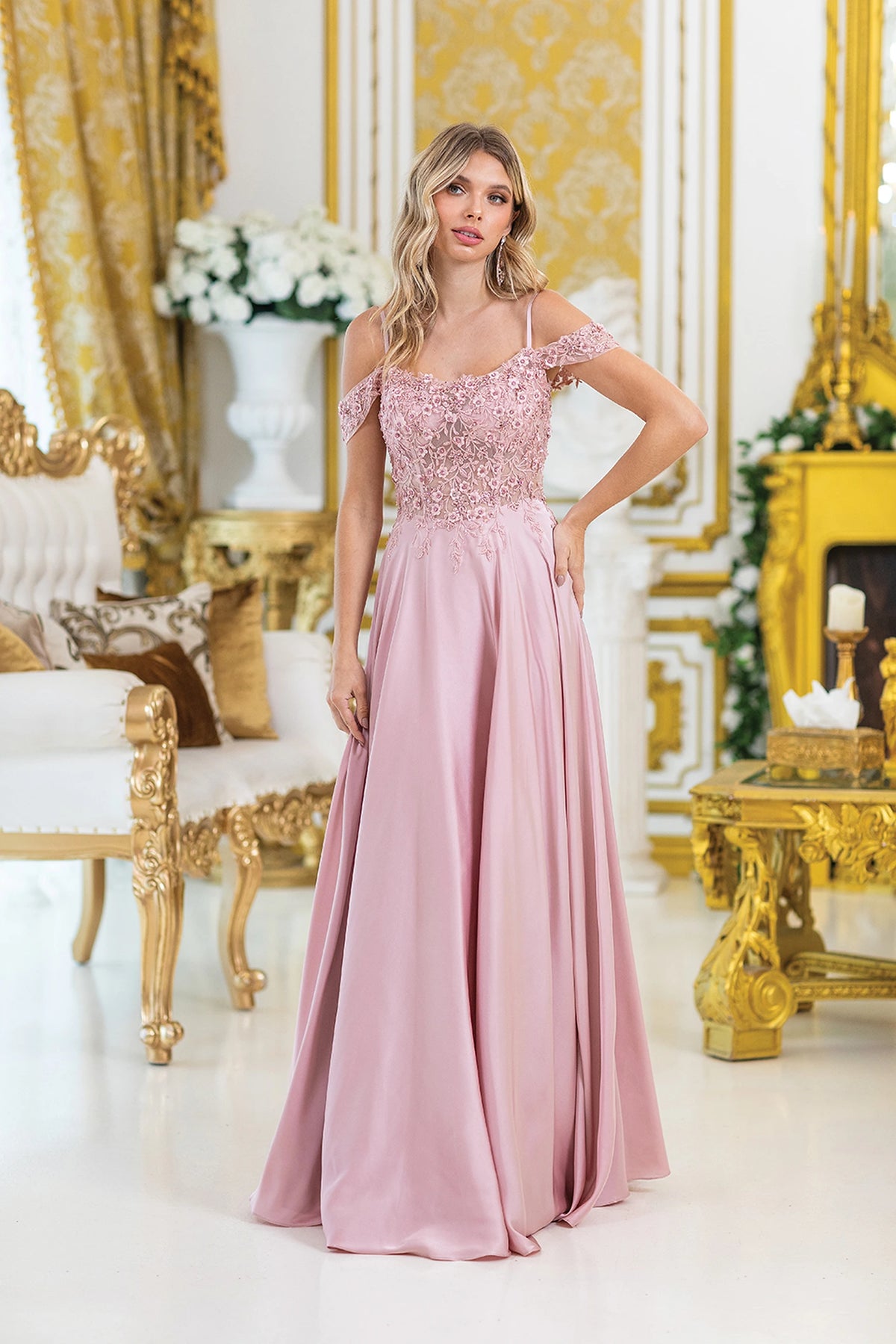 Featuring an off-the-shoulder neckline, this Light Rose Gold prom dress shows floral embellishments across the bodice.