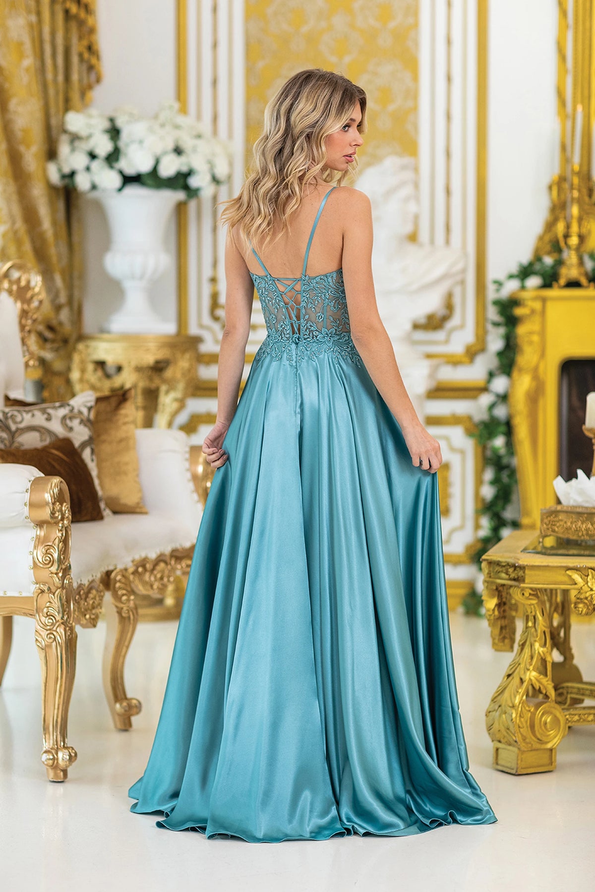 From the back, the Sage prom dress reveals its floor-length skirt.