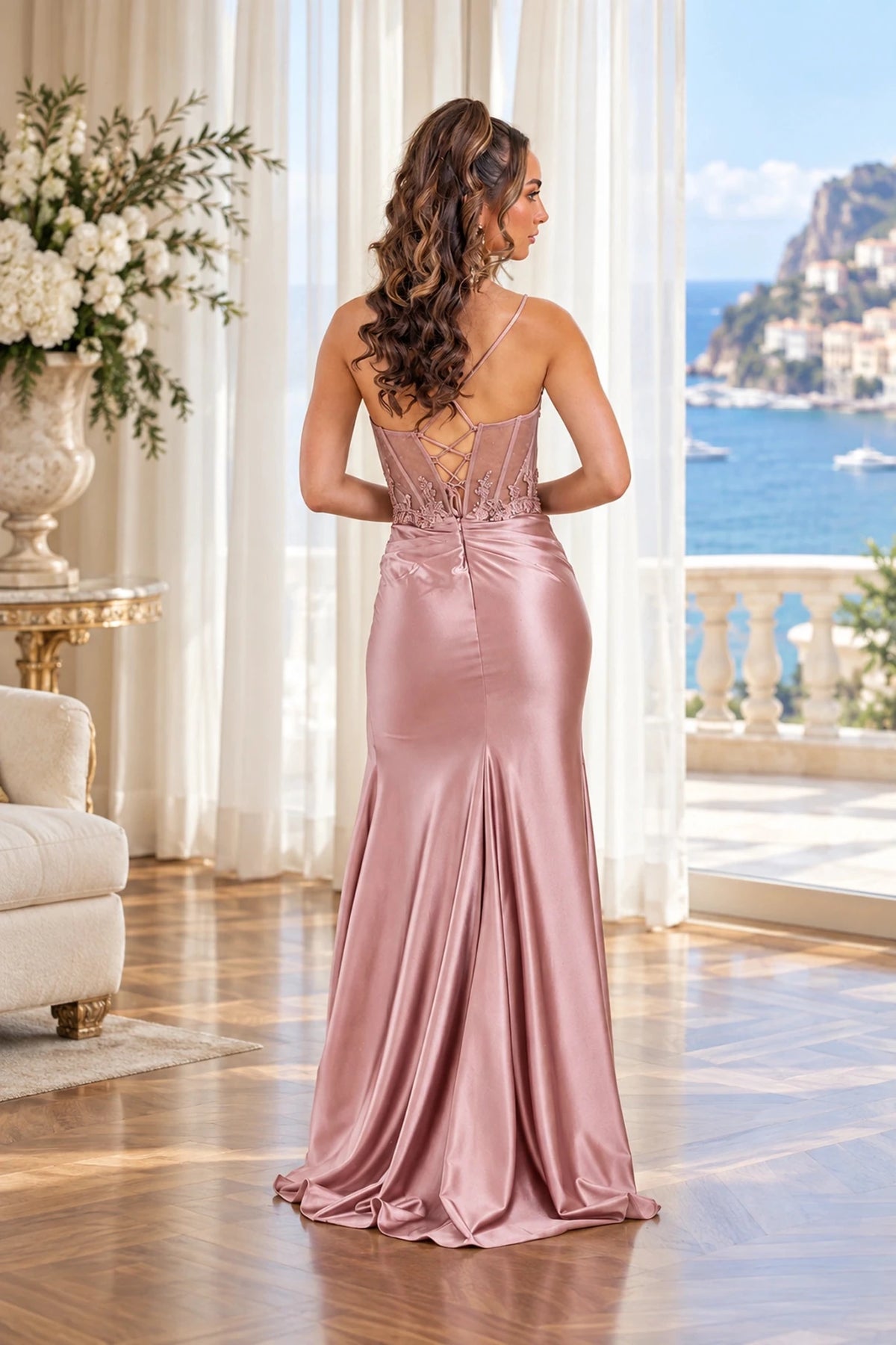 Lace-up back and sweeping train complete the Rose Gold Beaded Corset Prom & Evening Dress.