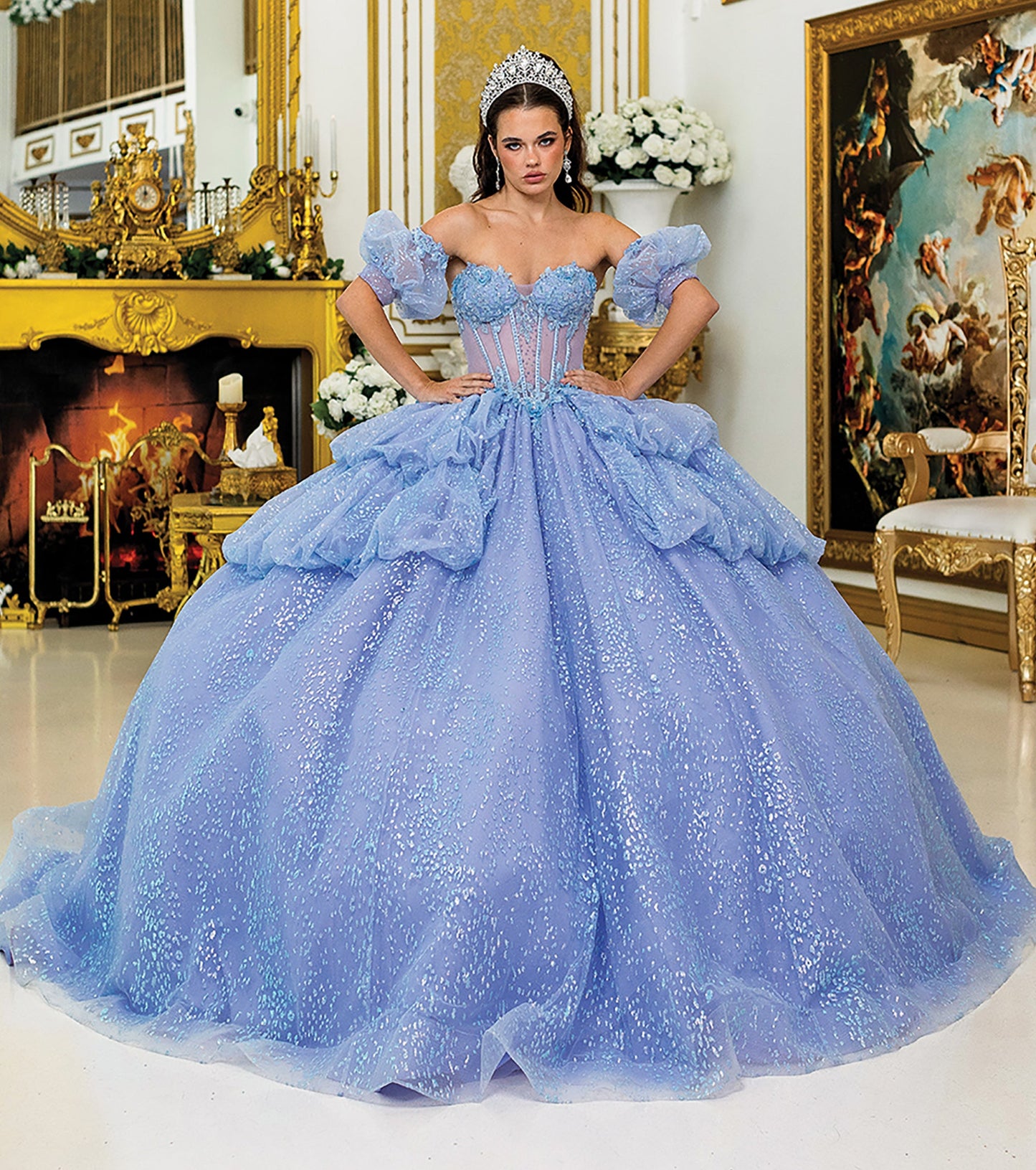 Quinceañera | Blue Lilac Off-Shoulder Ball Gown with Puffy Sleeves, Glitter Corset Bodice, and Layered Skirt | Emperatriz dress front