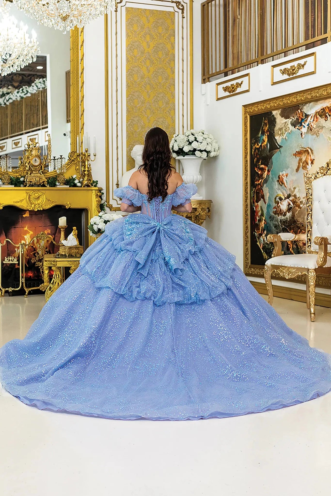 Quinceañera | Blue Lilac Off-Shoulder Ball Gown with Puffy Sleeves, Glitter Corset Bodice, and Layered Skirt