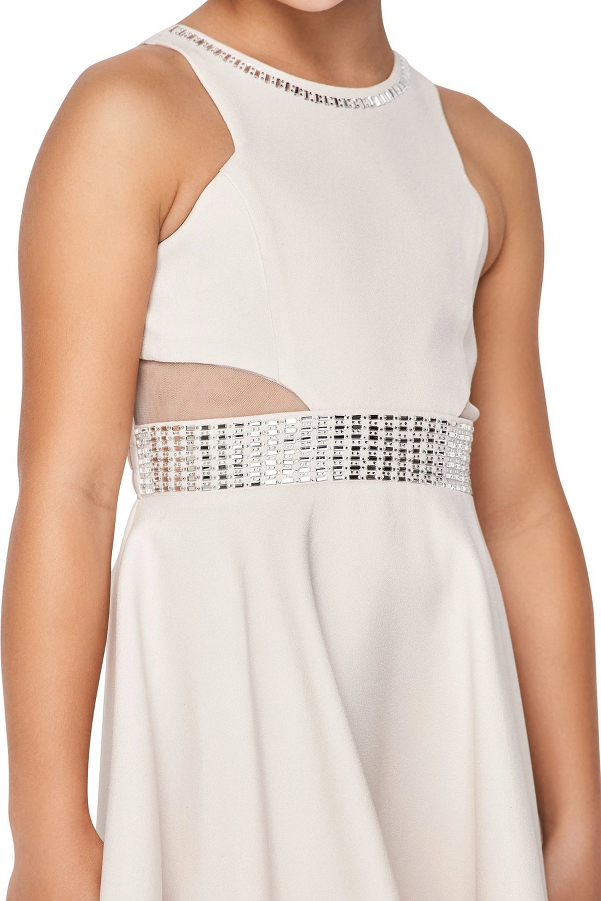 Detailed by a crystal-trimmed waistband, the Cream kids party dress reveals its construction.