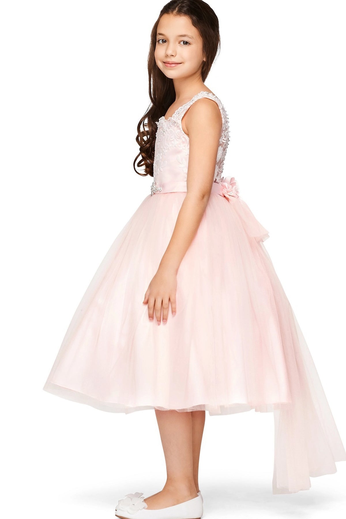 Detailed by a jeweled waist accent, the Pink kids party dress reveals its construction.