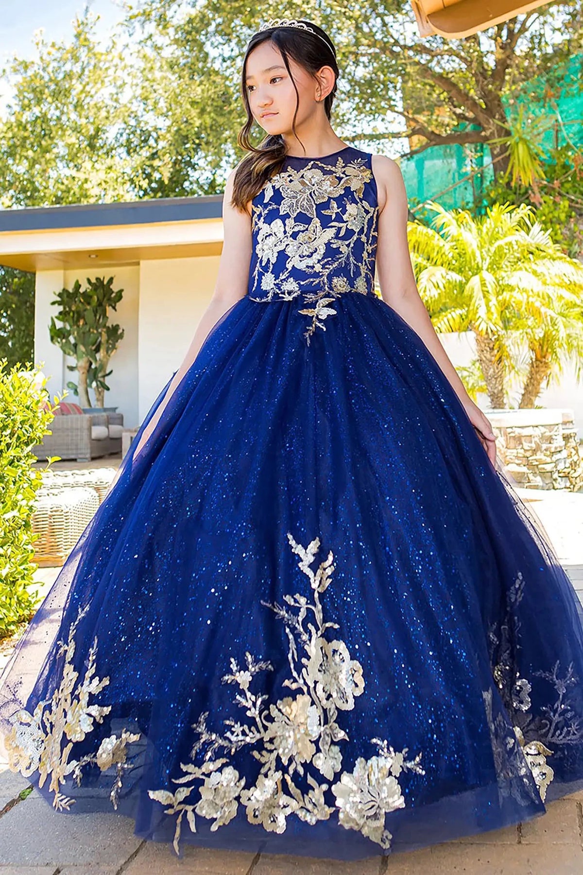 Navy mini quince dress with glitter tulle fitted bodice and layered skirt detail.