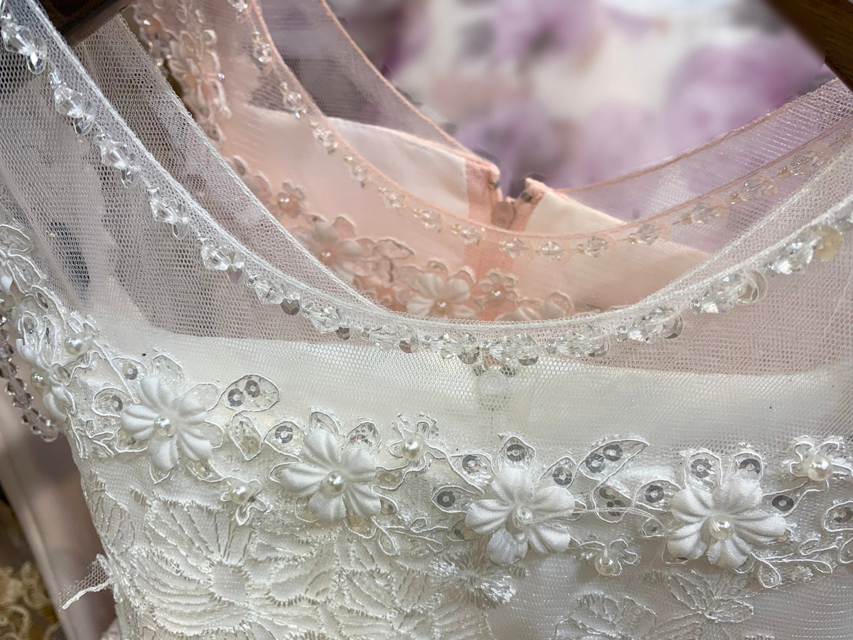 Front view of Off-White Illusion Lace Top with Shoulder Beads and Crystalize Tulle flower girl dress.