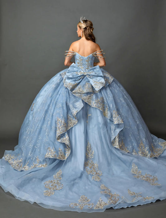Back view of a woman wearing dusty blue quinceañera, lace-up, glitter tulle, metallic embroidery, off-shoulder sleeves