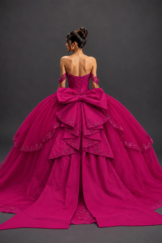 Fuchsia floral embroidered quinceanera dress, back view with lace-up closure