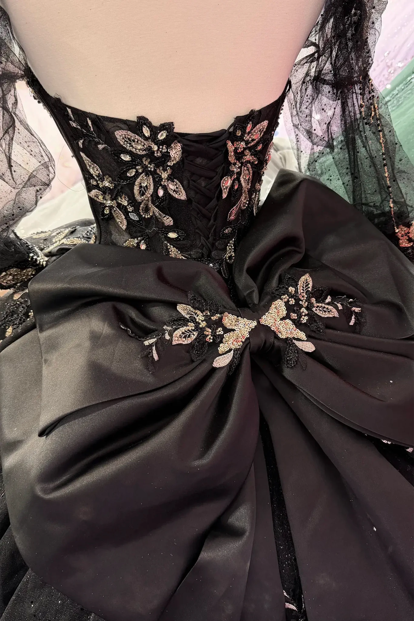 back of the quince dress with lace up back and large big bow