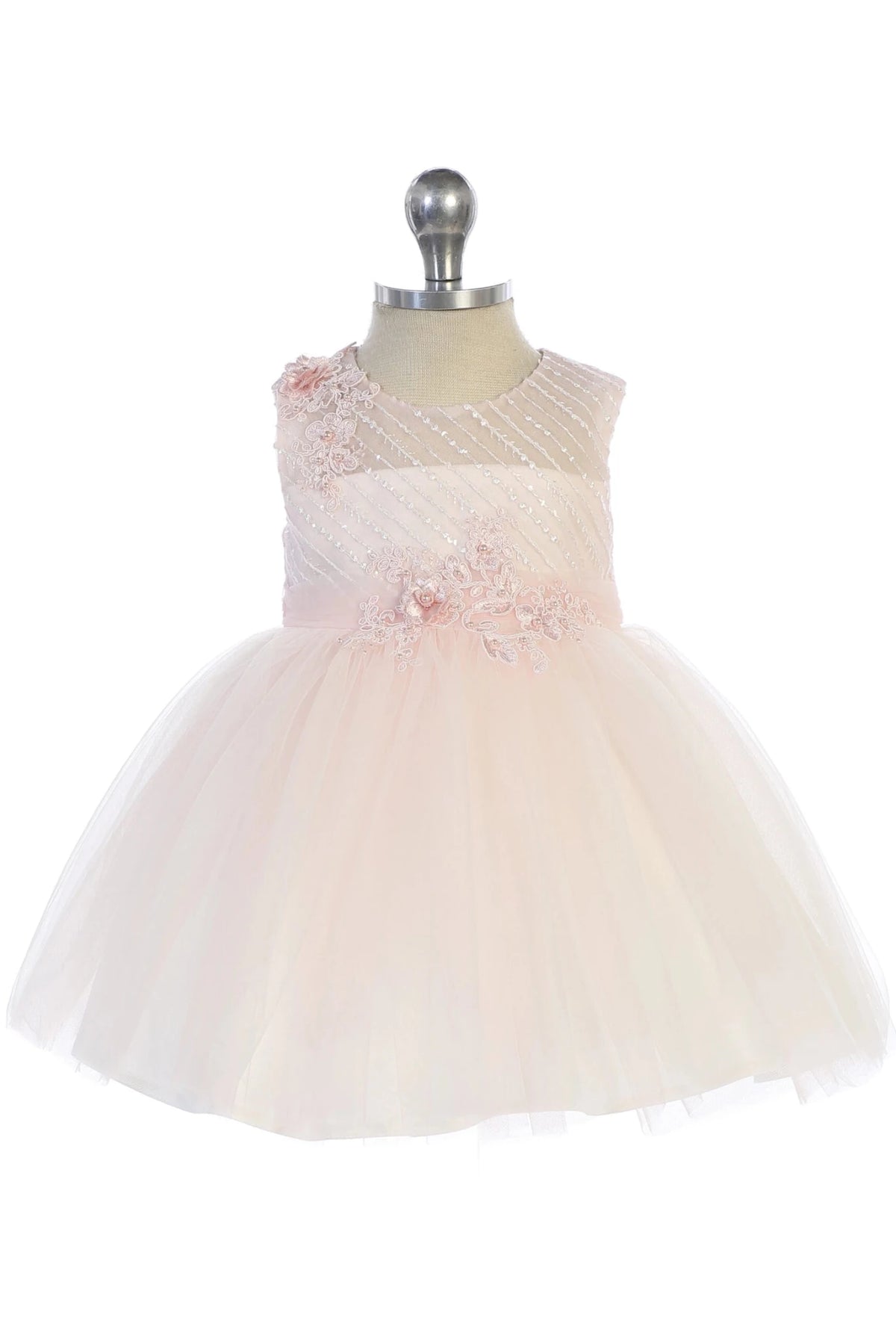 The blush flower girl dress features a sheer striped neckline.