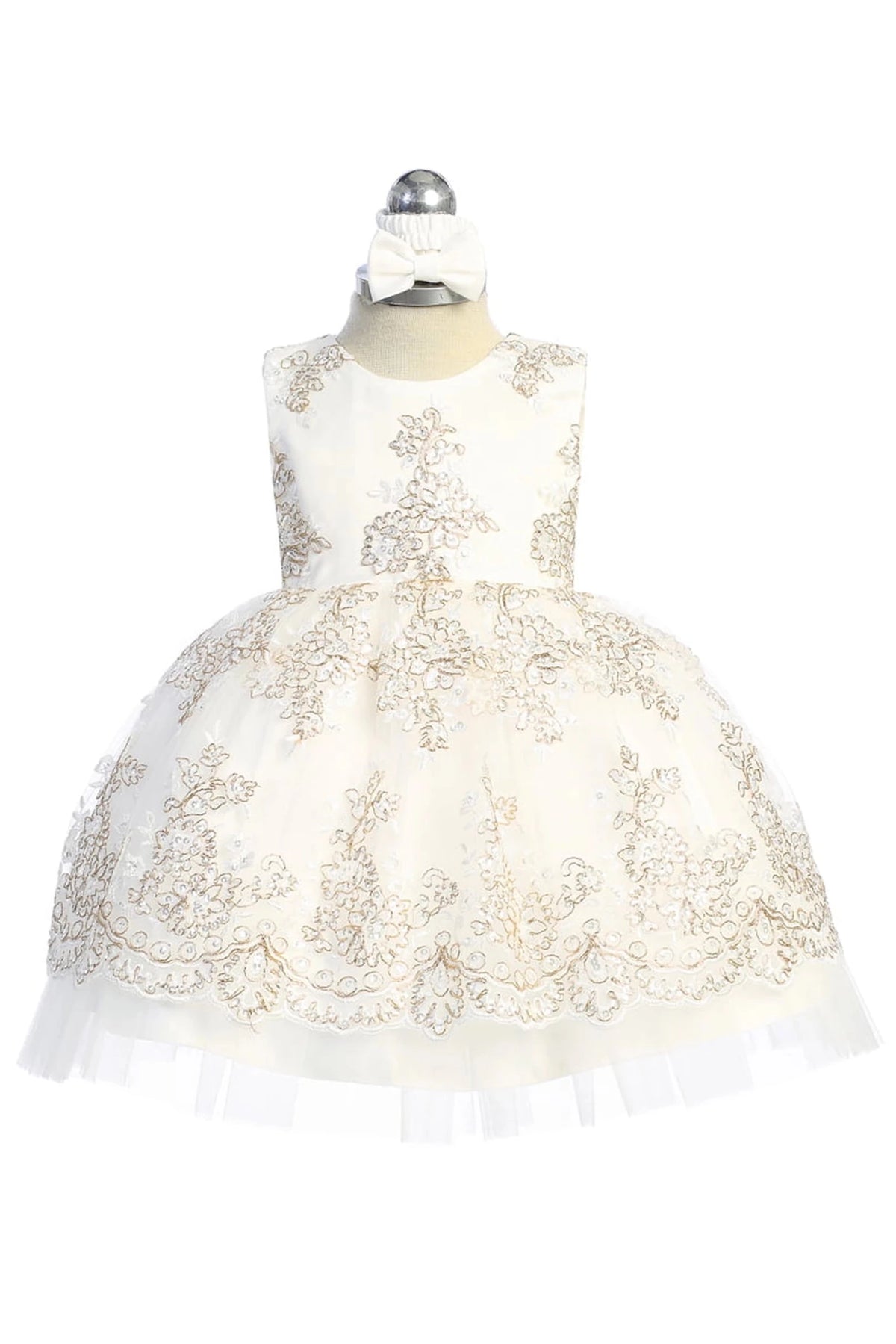 A view of a beaded lace bodice on the off-white flower girl dress.