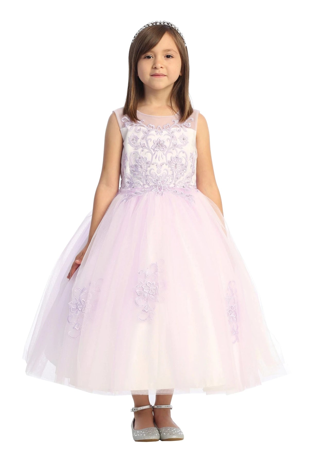 Scattered skirt appliques accent this lilac flower girl dress.