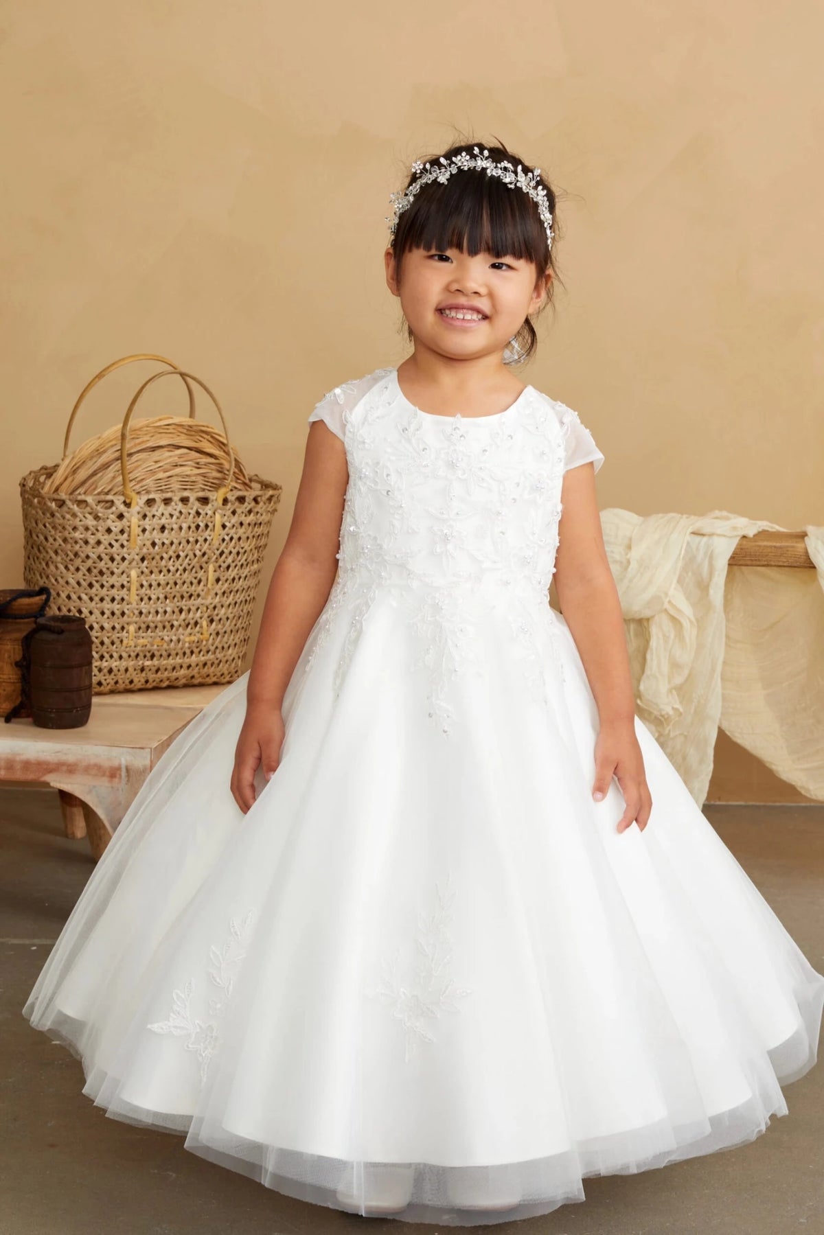 Front view of the ivory corded lace with illusion short sleeves flower girl dress.