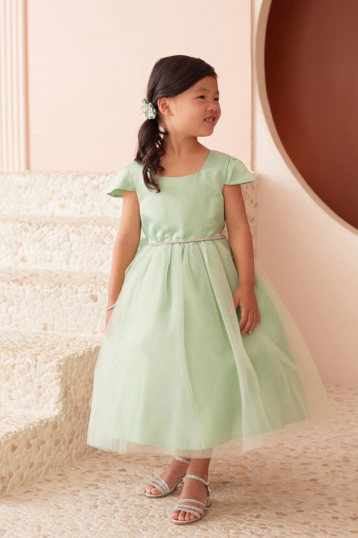 Sage kids pageant dress featuring a square satin neckline and tulle skirt.