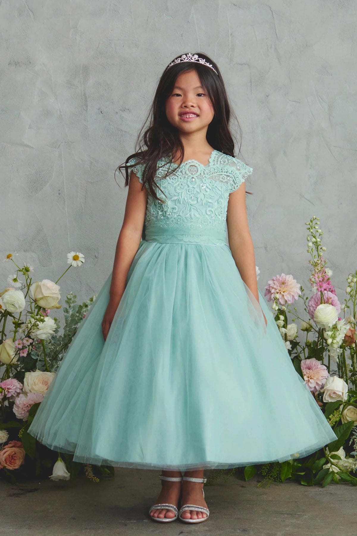 Sage flower girl dress, showing a pleated sash waist.