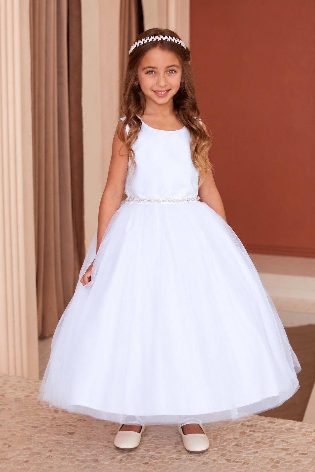 Full front view of Tiptop 5863 white flower girl dress with a smooth satin bodice, beaded waist and full tulle skirt.