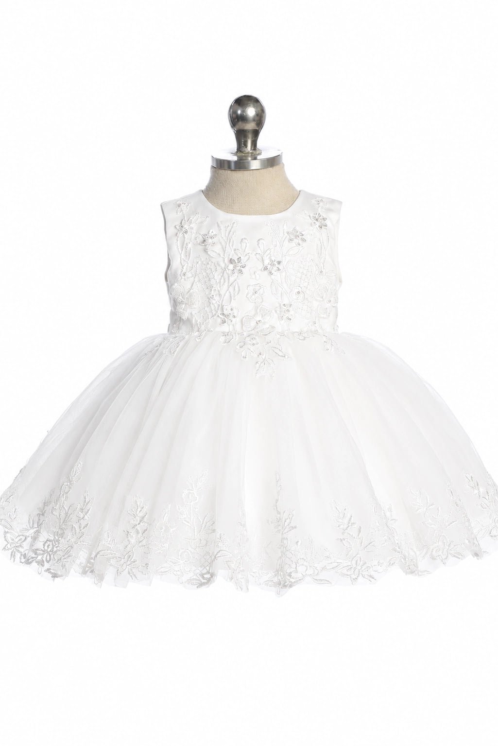 Floral skirt border: detail of the off-white flower girl dress.