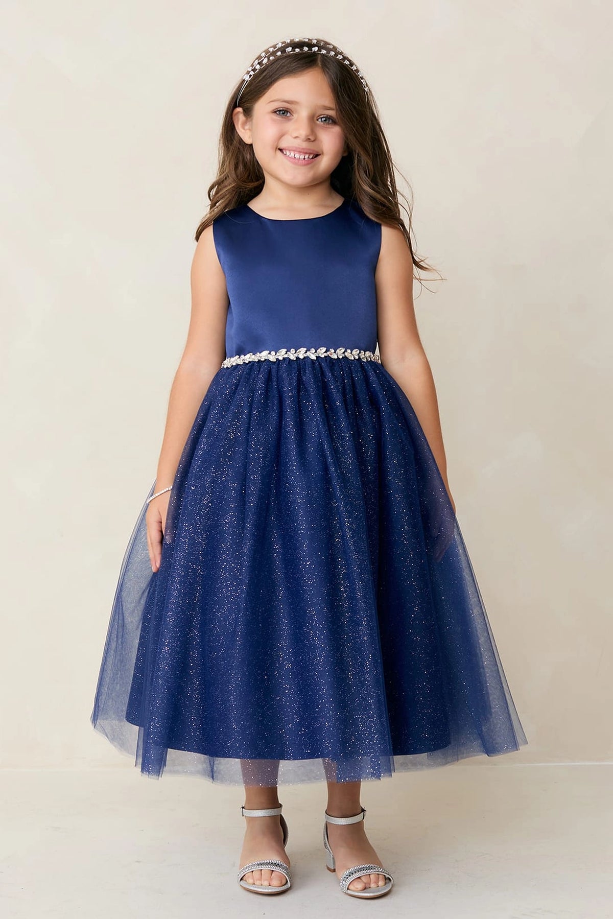 Navy Blue kids pageant dress featuring a satin bodice and sparkling tulle skirt.