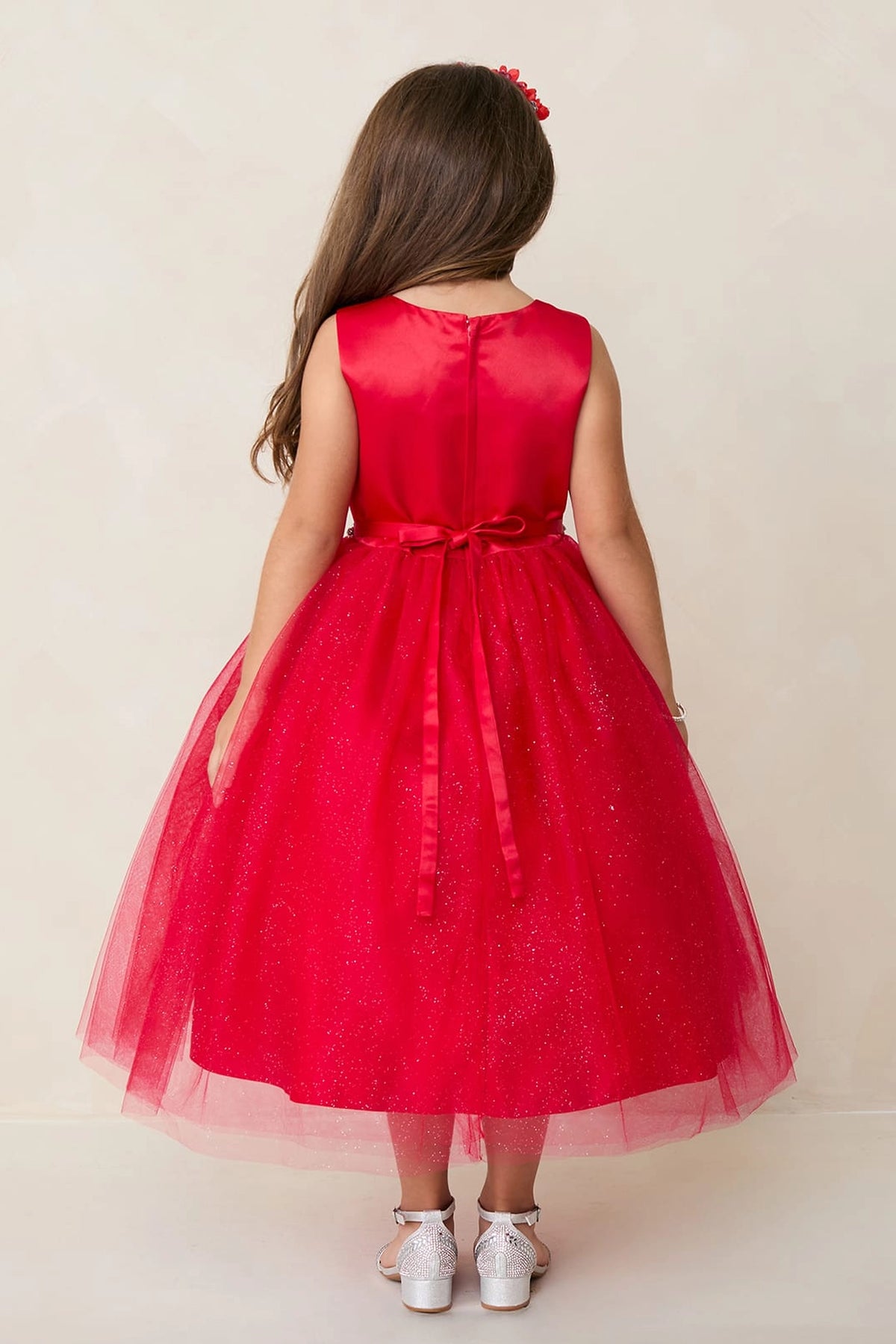 The Red kids pageant dress has a tied sash across the back waist.