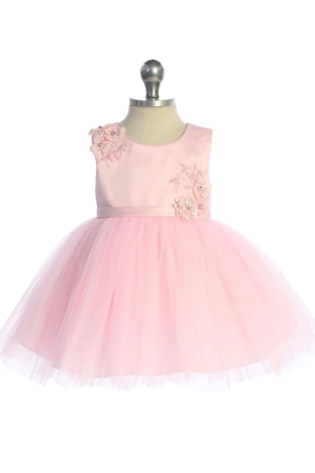 In view: flower waist appliques of a pink flower girl dress.
