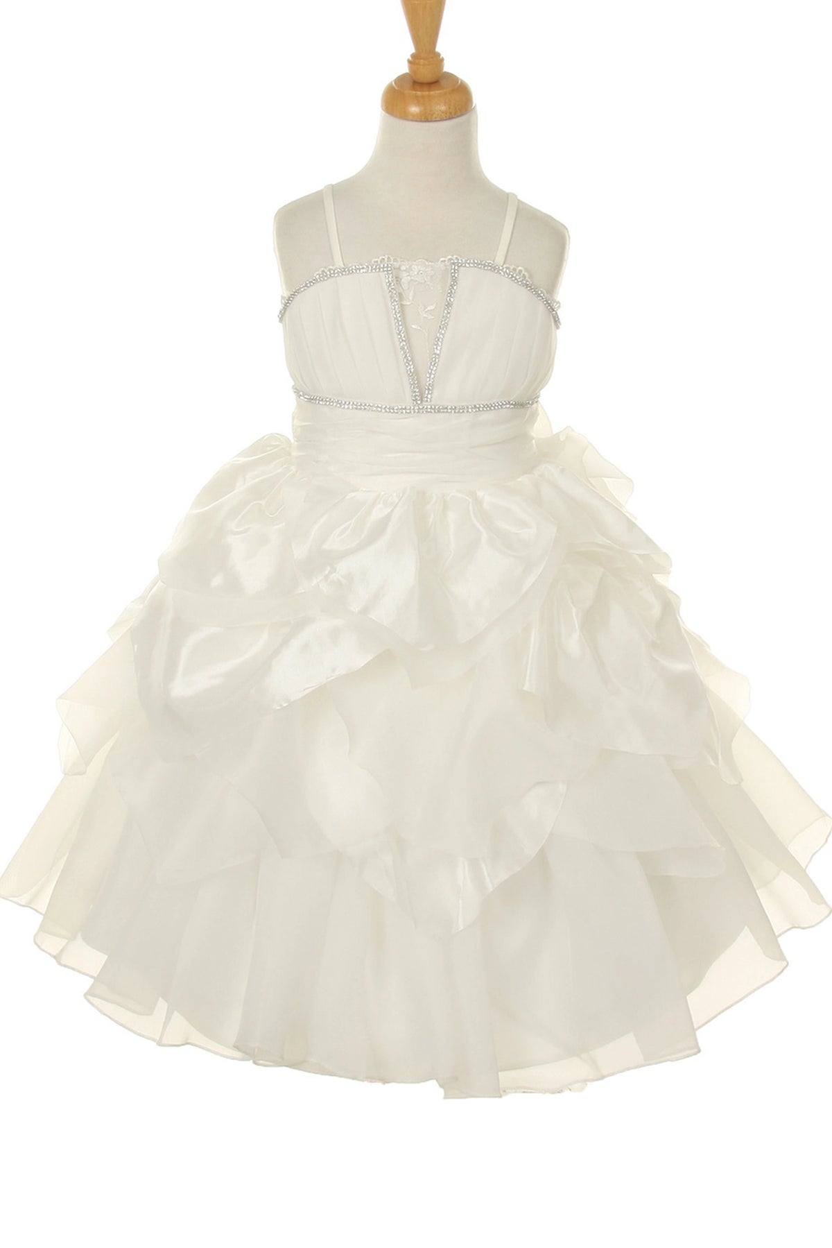 Detailed by sculpted layered skirt ruffles, the Ivory kids party dress reveals its construction.