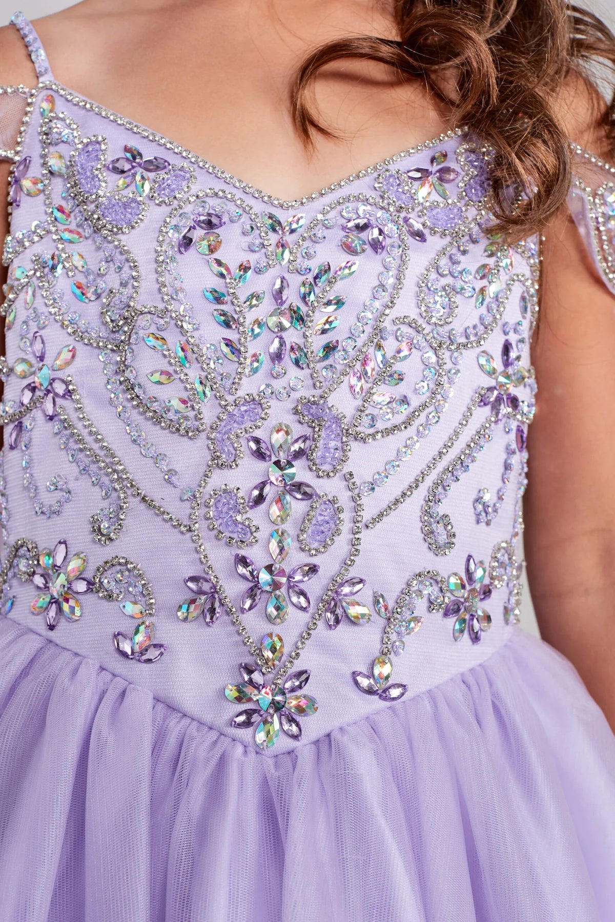 Visible details on the Lilac kids pageant dress include rhinestones across the upper bodice.
