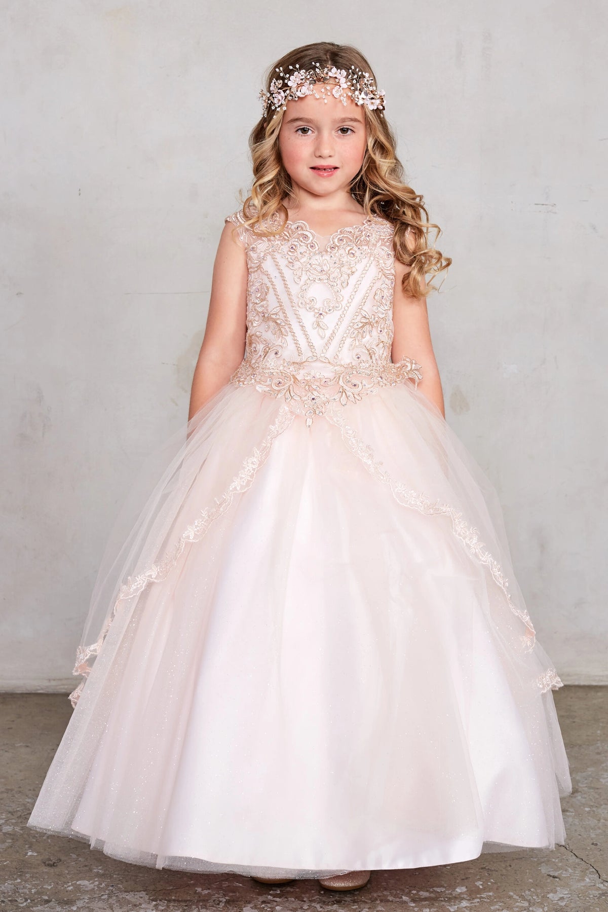 Rose Gold kids pageant dress featuring lace-trimmed layers of glitter tulle.